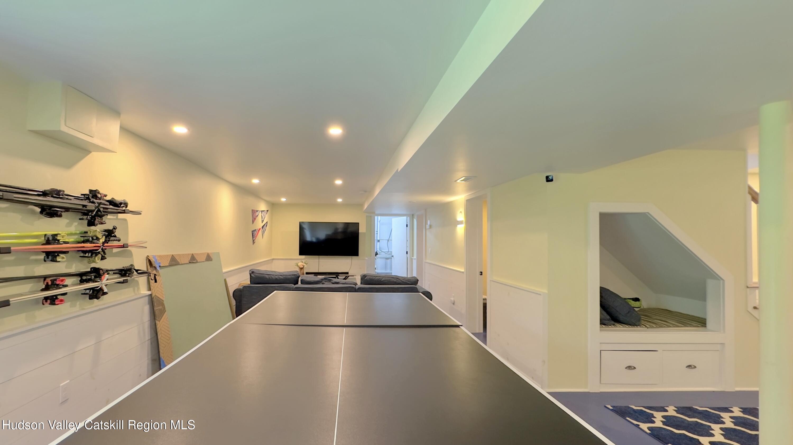 3223 Sleepy Hollow Road Athens, NY 12015 - Photo 40 of 73 a view of a living room and a flat screen tv