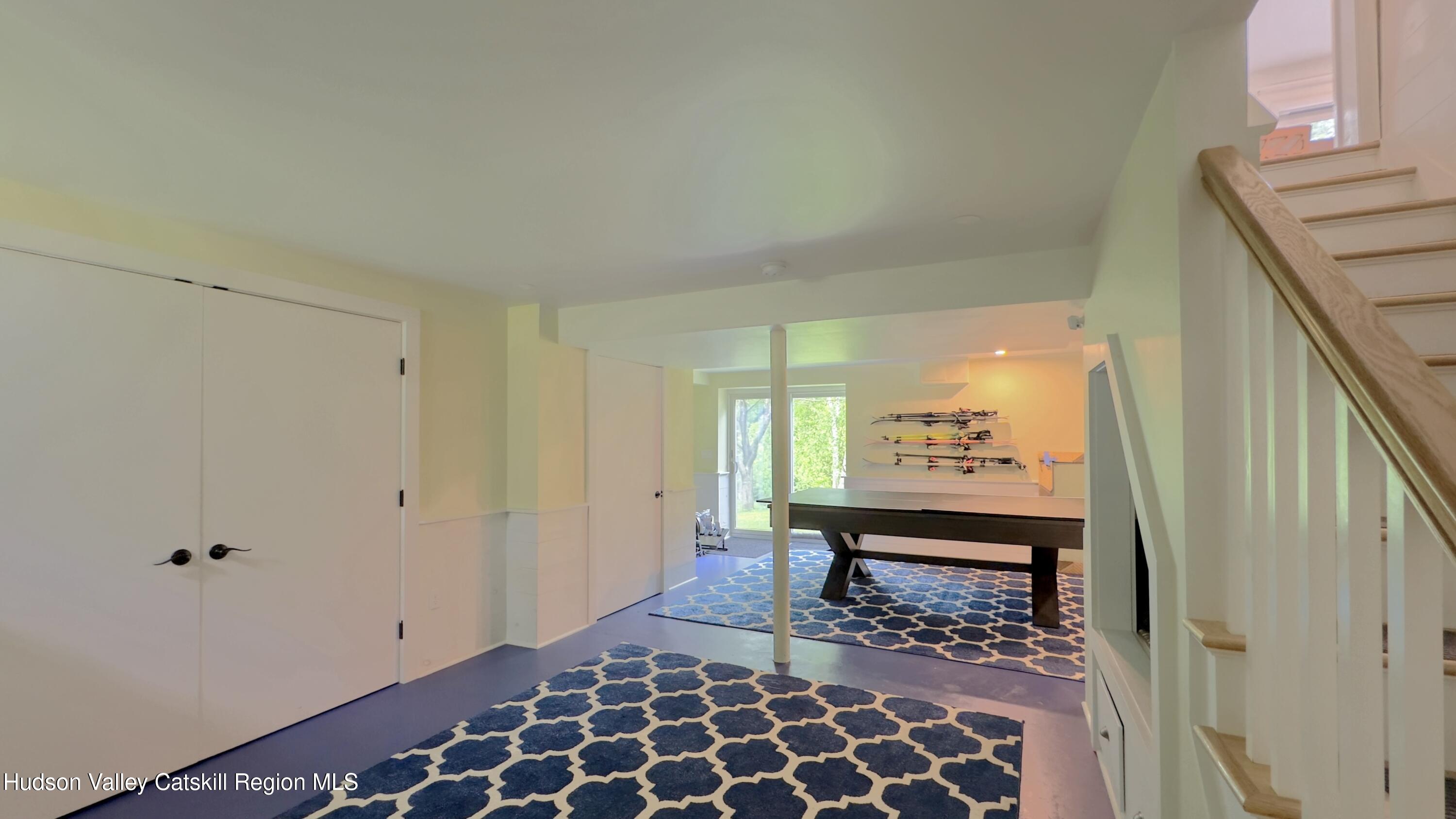 3223 Sleepy Hollow Road Athens, NY 12015 - Photo 42 of 73 a view of a hallway with wooden floor and a bathroom