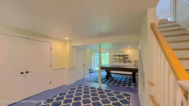 a view of a house with backyard sitting area and garden