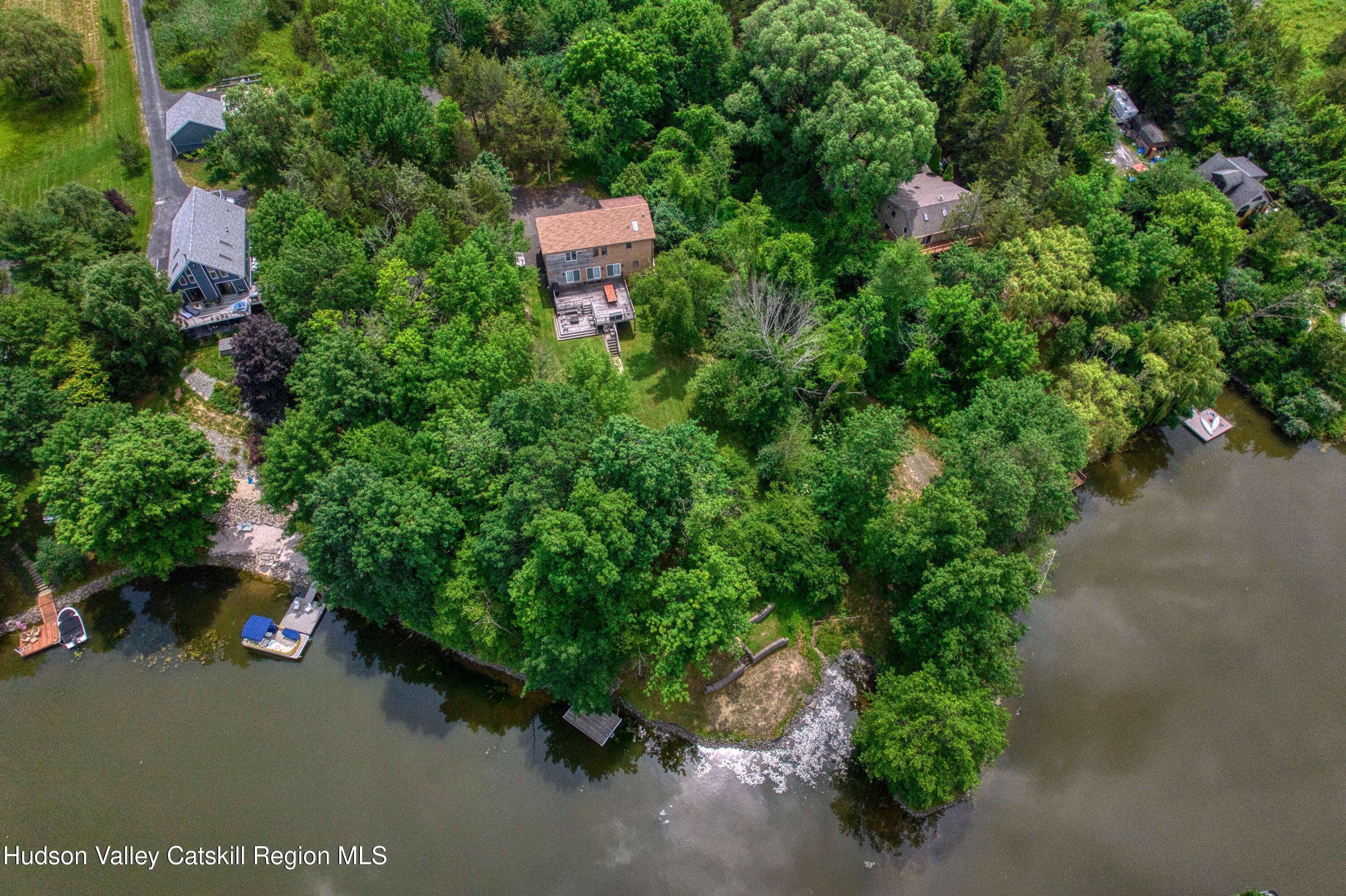 3223 Sleepy Hollow Road Athens, NY 12015 - Photo 50 of 73 an aerial view of a house with a yard and parking space
