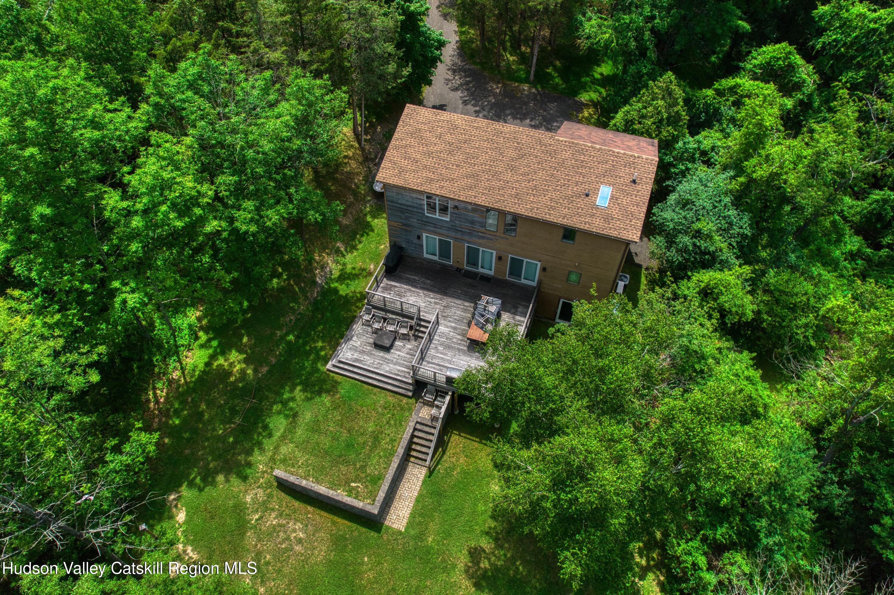 3223 Sleepy Hollow Road Athens, NY 12015 - Photo 61 of 73 an aerial view of a house with yard table and chairs