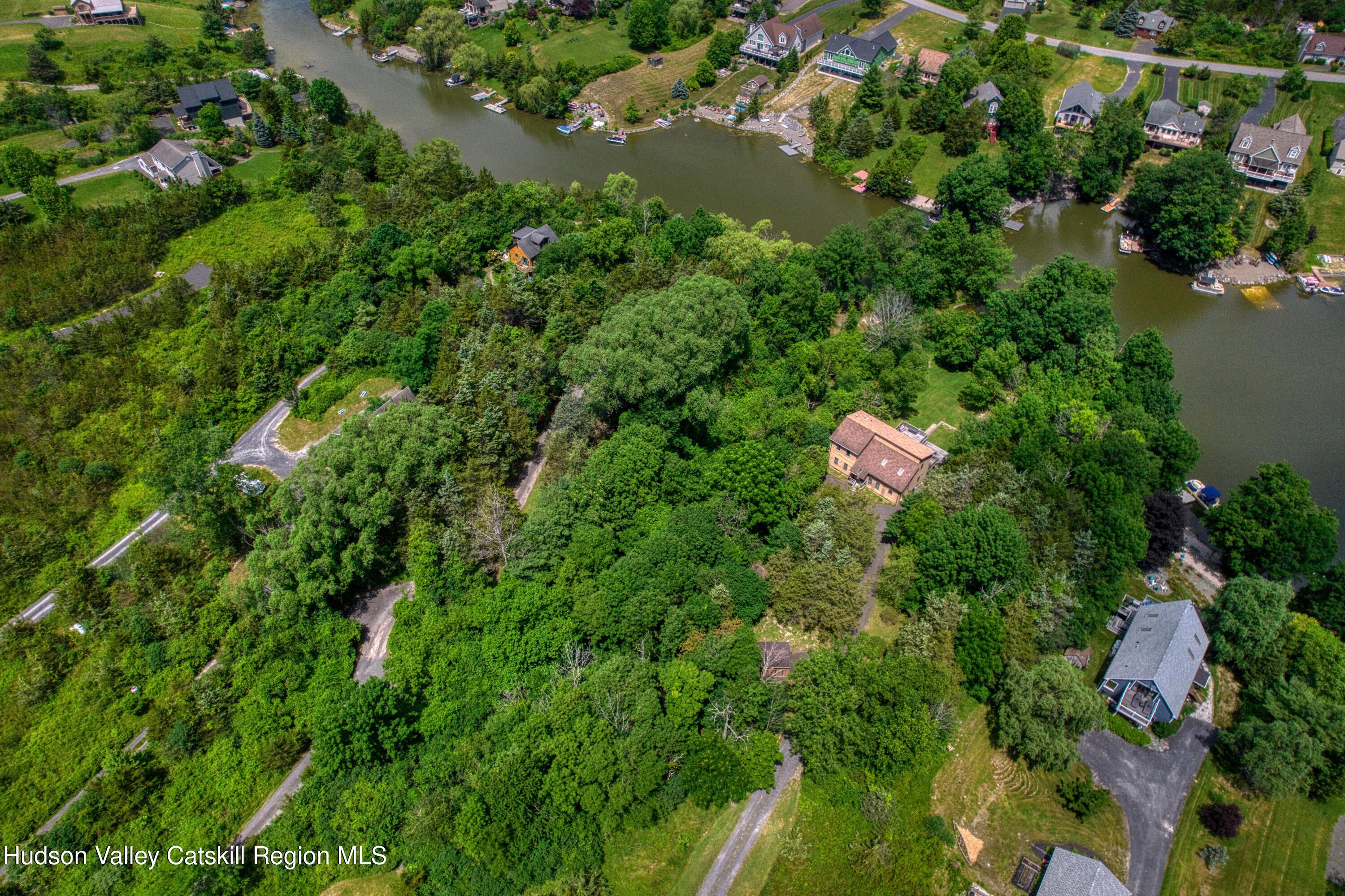 3223 Sleepy Hollow Road Athens, NY 12015 - Photo 65 of 73 an aerial view of residential house with outdoor space and trees all around
