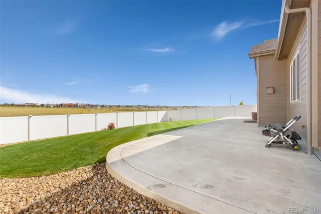 a view of a terrace with a yard