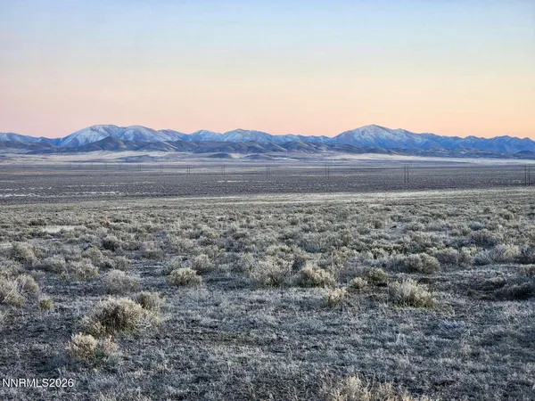 a view of ocean and mountain