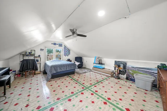 a bedroom with furniture a bed and a couch