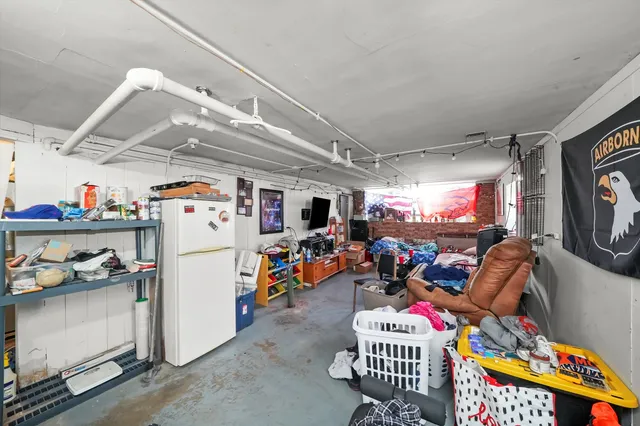 a storage room with furniture and toys