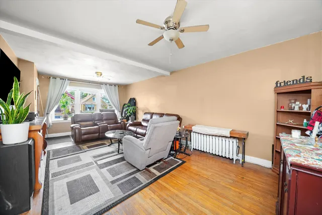 a living room with furniture fireplace and a flat screen tv