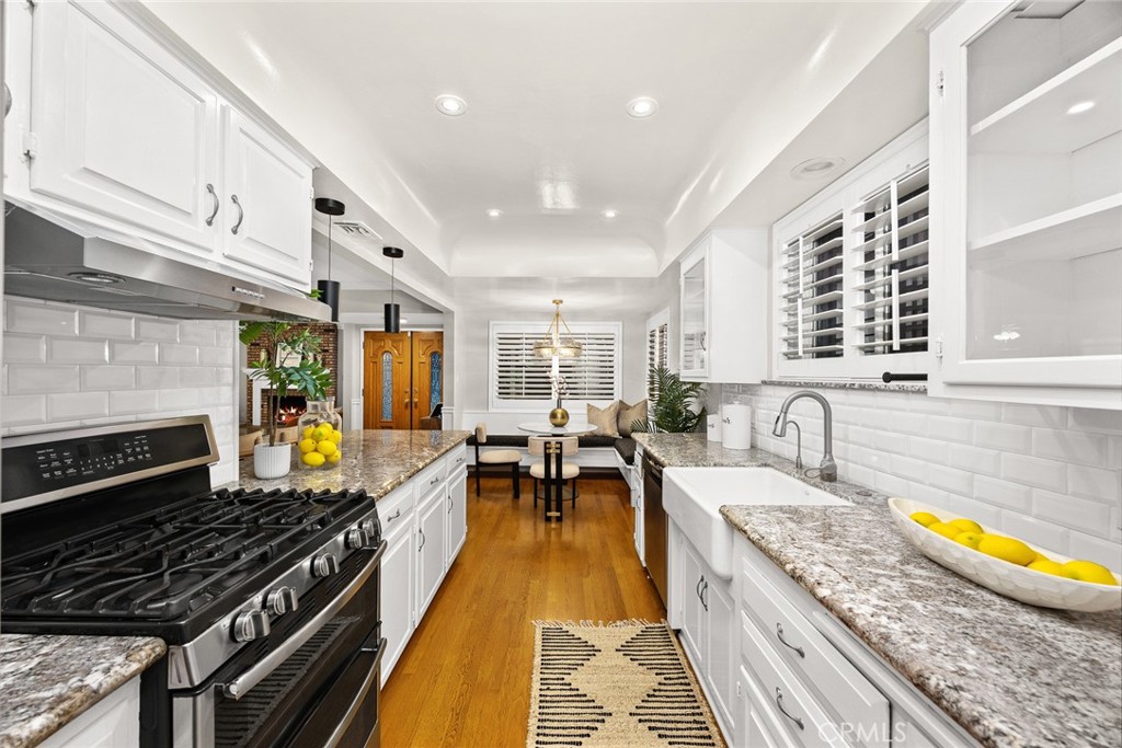 378 Patterson Drive Monrovia, CA 91016 - Photo 12 of 42 a kitchen with stainless steel appliances granite countertop a stove and cabinets