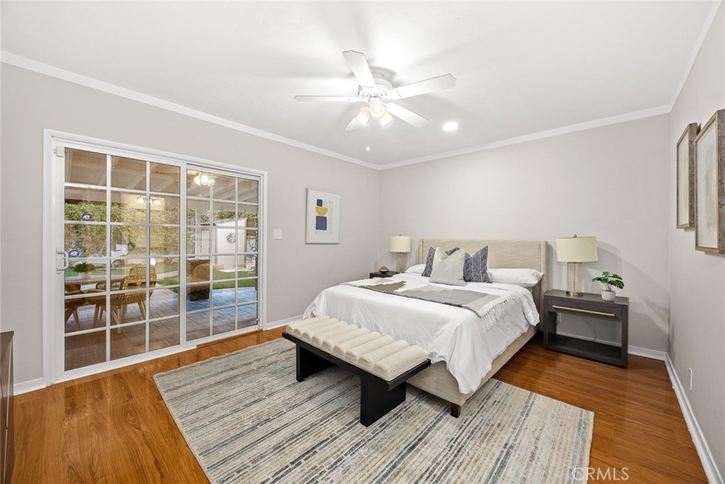 378 Patterson Drive Monrovia, CA 91016 - Photo 14 of 42 a spacious bedroom with a bed and wooden floor