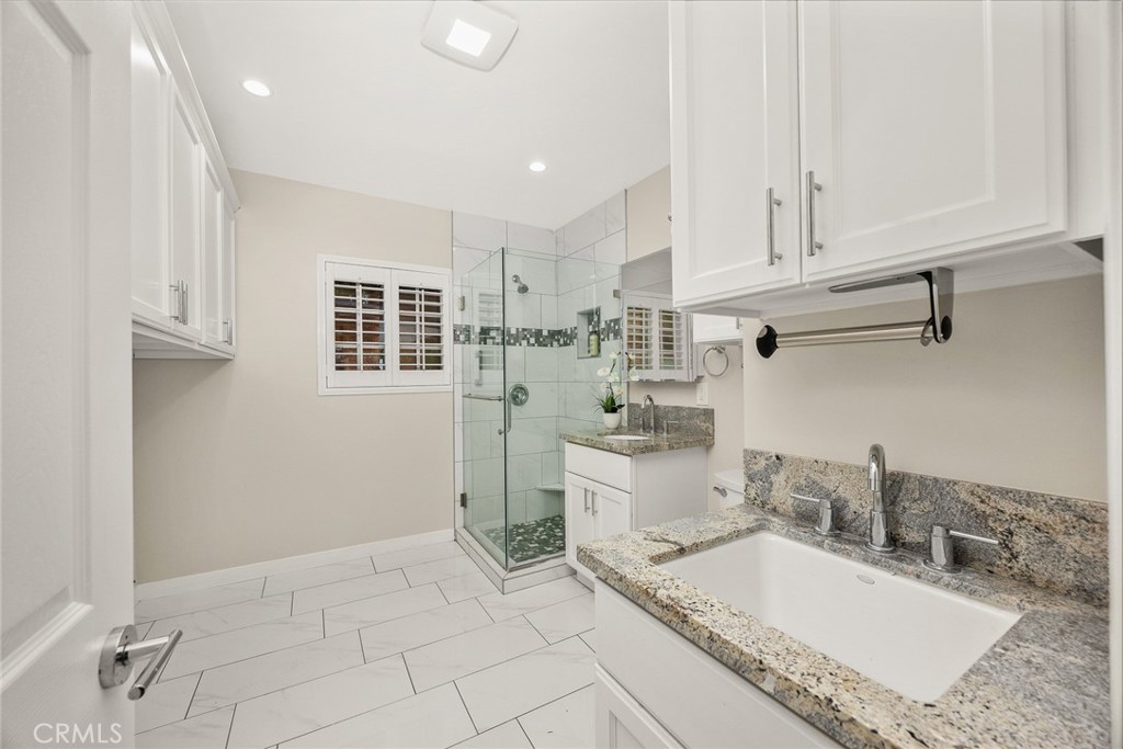 378 Patterson Drive Monrovia, CA 91016 - Photo 21 of 42 a room with a sink and cabinets