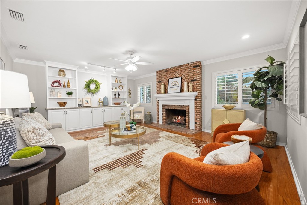 378 Patterson Drive Monrovia, CA 91016 - Photo 6 of 42 a living room with furniture and a fireplace