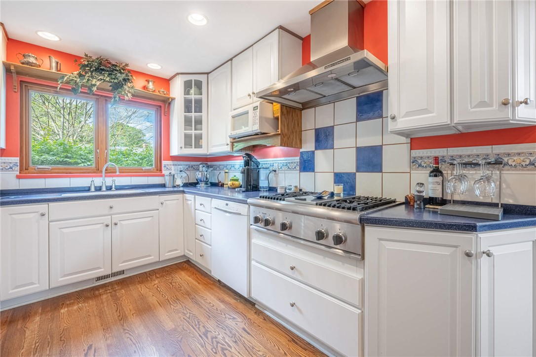 156 West Hadley Road Dayton, OH 45419 - Photo 11 of 71 This bright kitchen features ample counter space and appliances, perfect for culinary adventures.