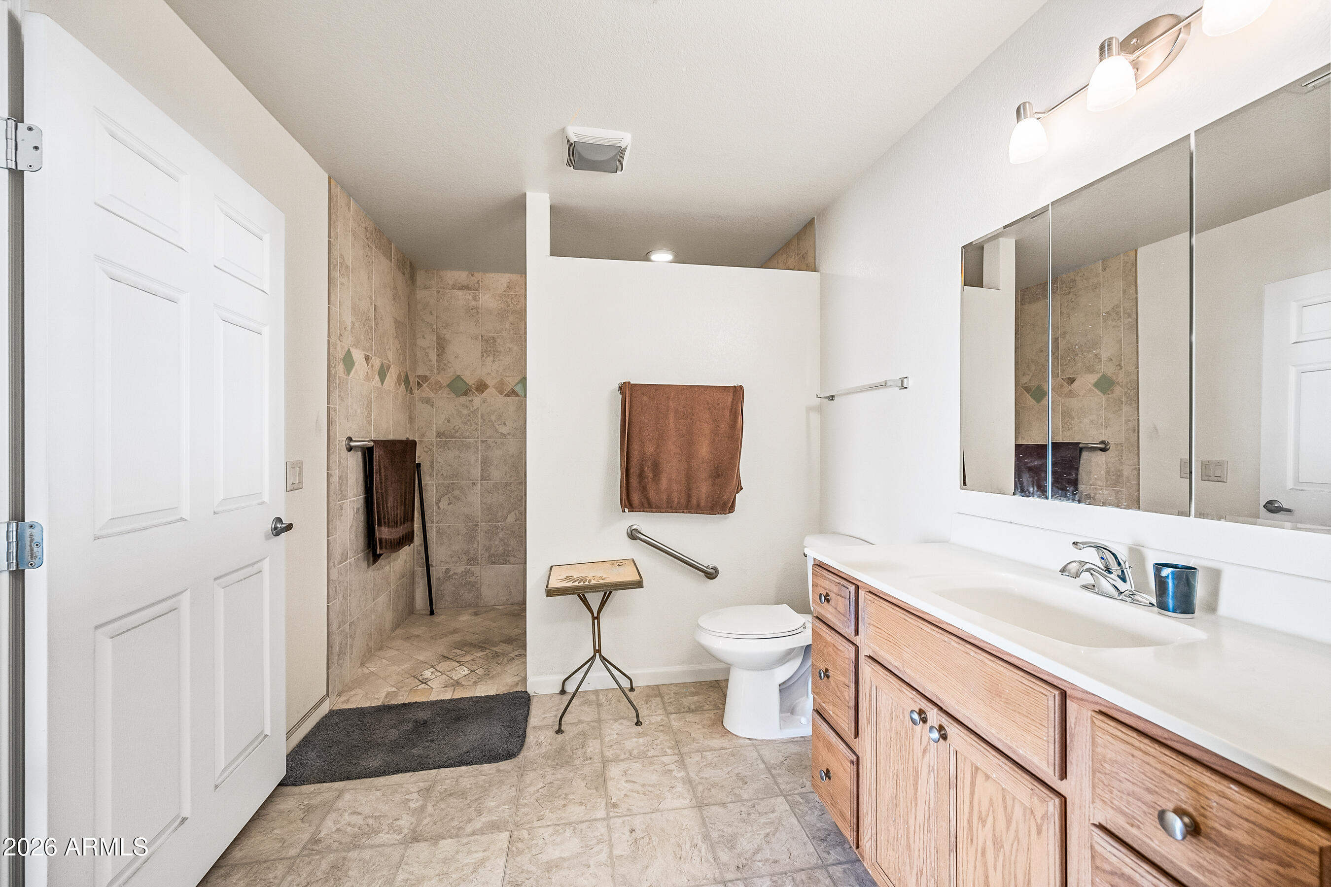 1108 West Mission Lane Phoenix, AZ 85021 - Photo 14 of 30 a spacious bathroom with a sink toilet and shower