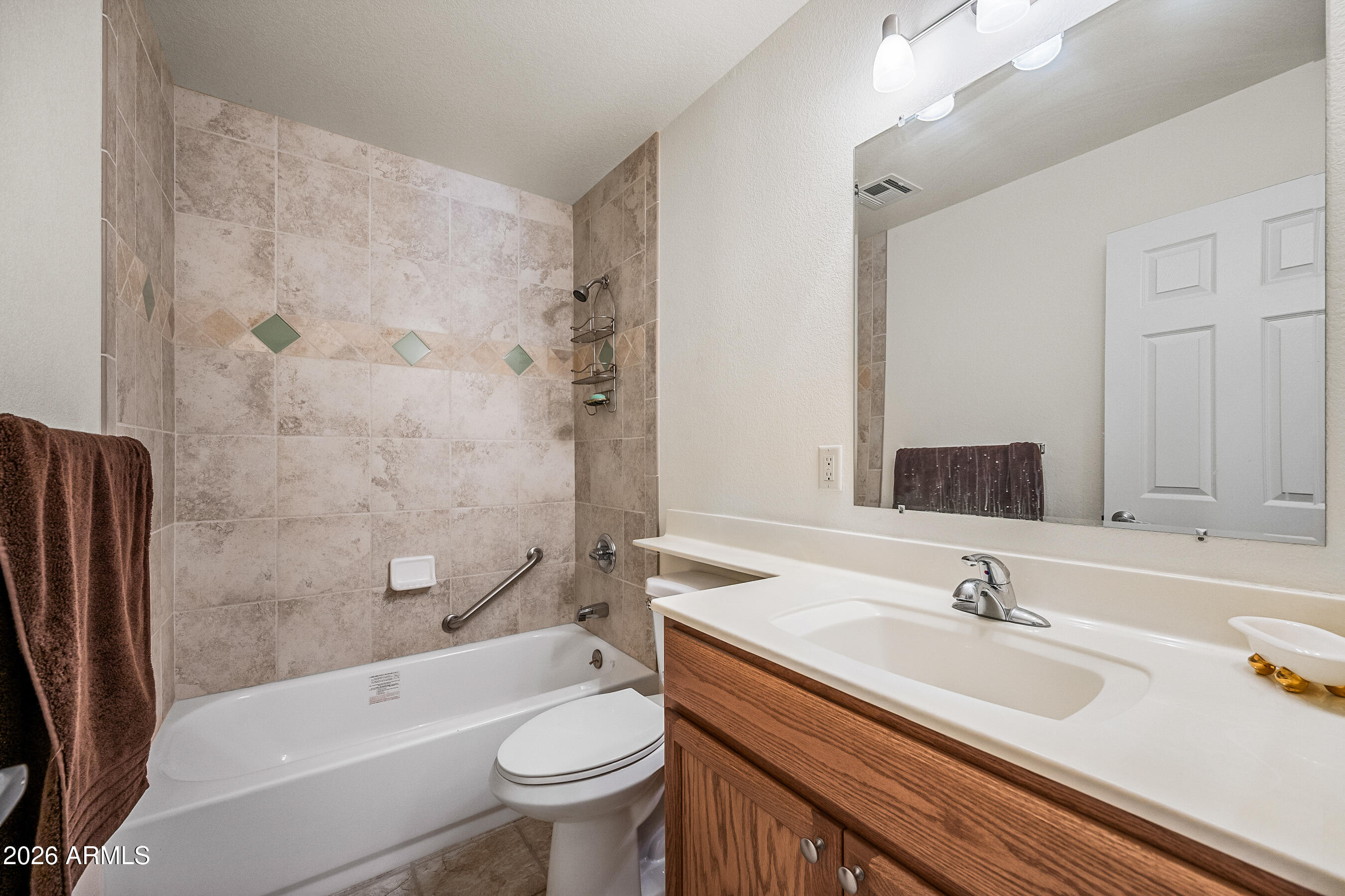 1108 West Mission Lane Phoenix, AZ 85021 - Photo 20 of 30 a bathroom with a sink toilet and shower