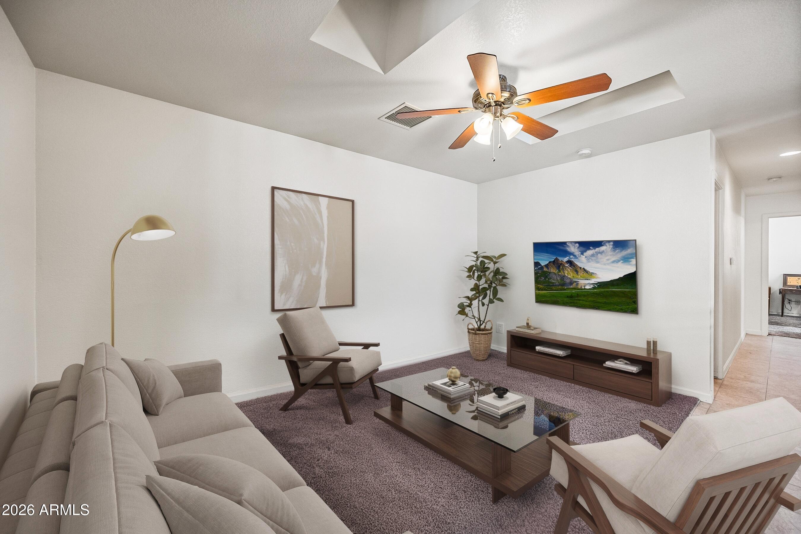 1108 West Mission Lane Phoenix, AZ 85021 - Photo 3 of 30 a living room with furniture and a flat screen tv