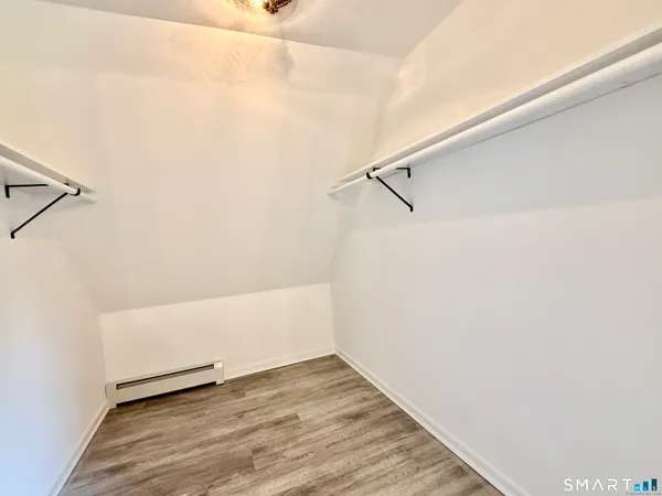 a view of small space with racks on the wall
