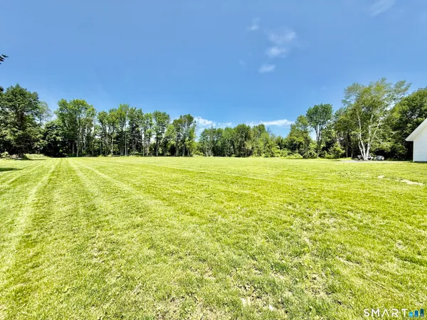 a view of an outdoor space and a yard
