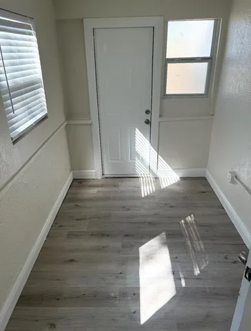 a view of a car parked in front of a house