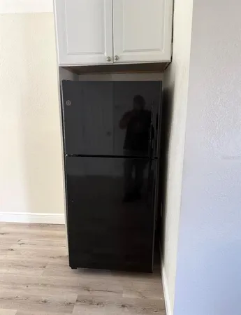 a close view of a refrigerator in kitchen