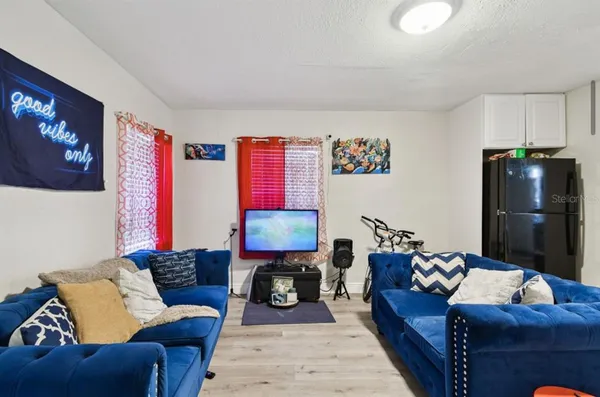 a living room with furniture and a couch