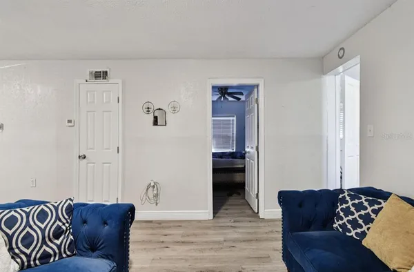a living room with furniture and a couch