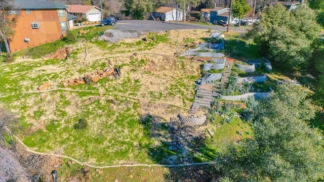 a view of swimming pool with a yard