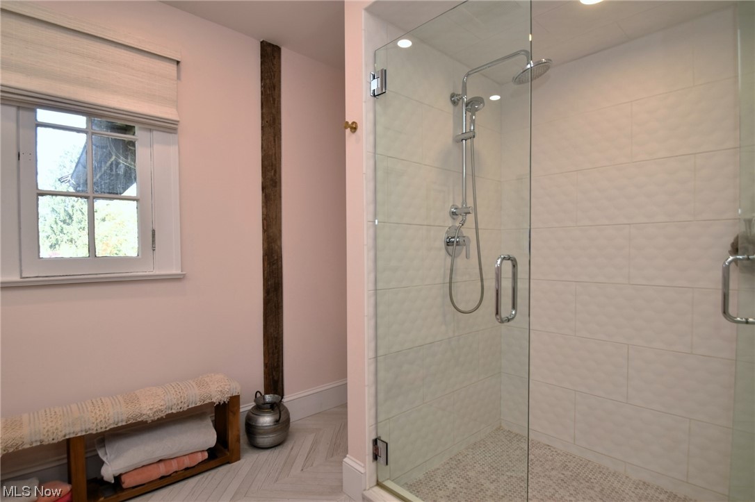 2257 South Overlook Road Cleveland, OH 44106 - Photo 21 of 35 Bathroom with parquet floors and a shower with door
