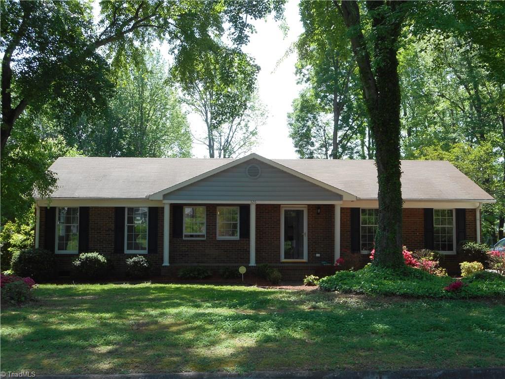 When you visualize living here, you generate powerful feelings of ownership knowing this home could be yours. In this front view we can see that the home is brick and vinyl. We can see the green grass, the mature landscaping, mature trees and the front porch. Wave hello to your neighbors as they are walking past your home....