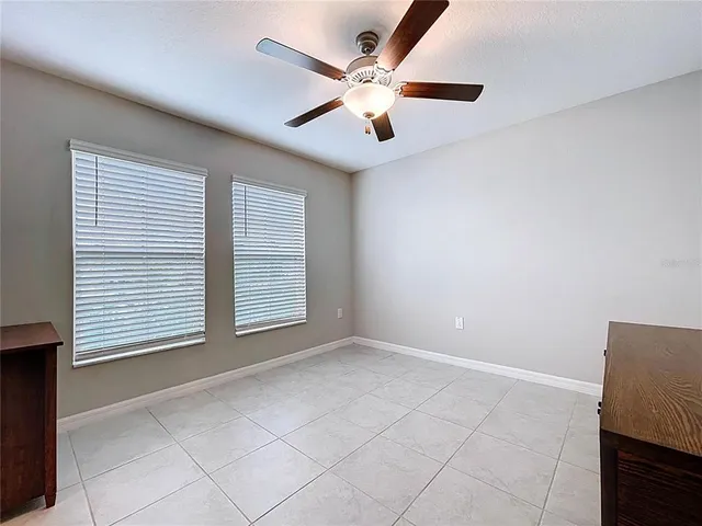 a kitchen with stainless steel appliances granite countertop a sink and a stove
