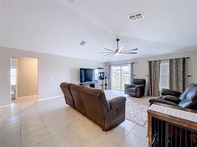 a bathroom with a shower and a sink