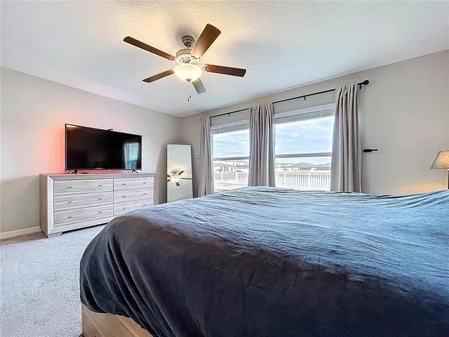 a view of livingroom with furniture and windows