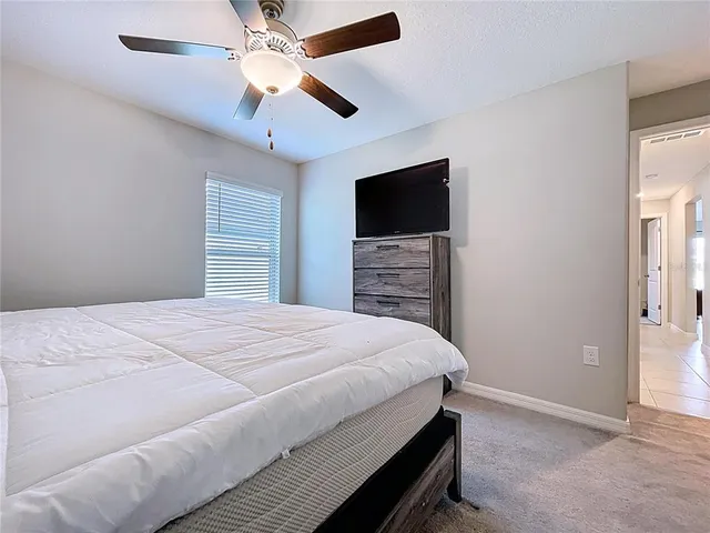 an aerial view of residential houses and outdoor space