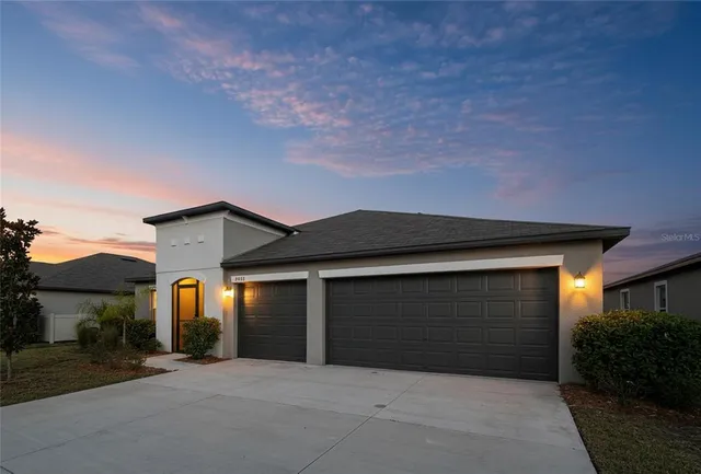 a front view of a house with yard