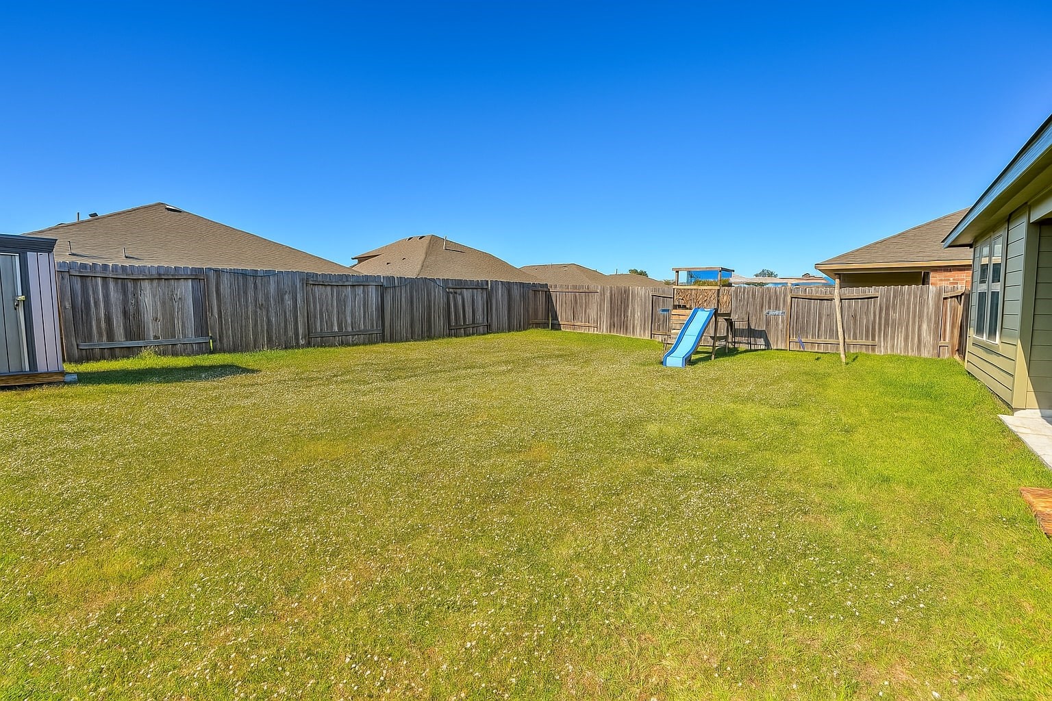 1714 Cooper Bluff Court Rosenberg, TX 77469 - Photo 16 of 21 a view of a house with a yard