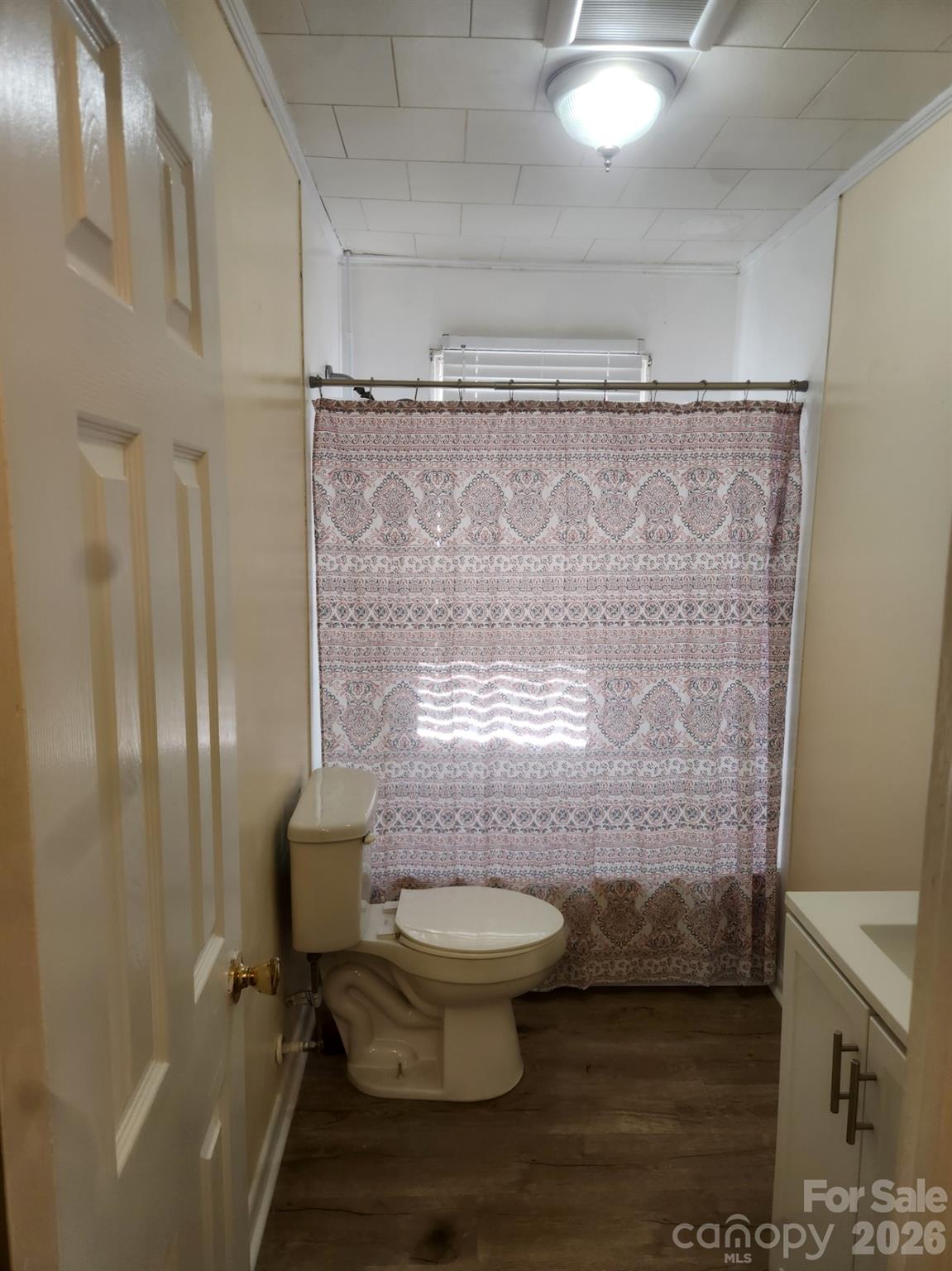 155 Robbins Street Southwest Concord, NC 28025 - Photo 11 of 19 a bathroom with a toilet and a shower