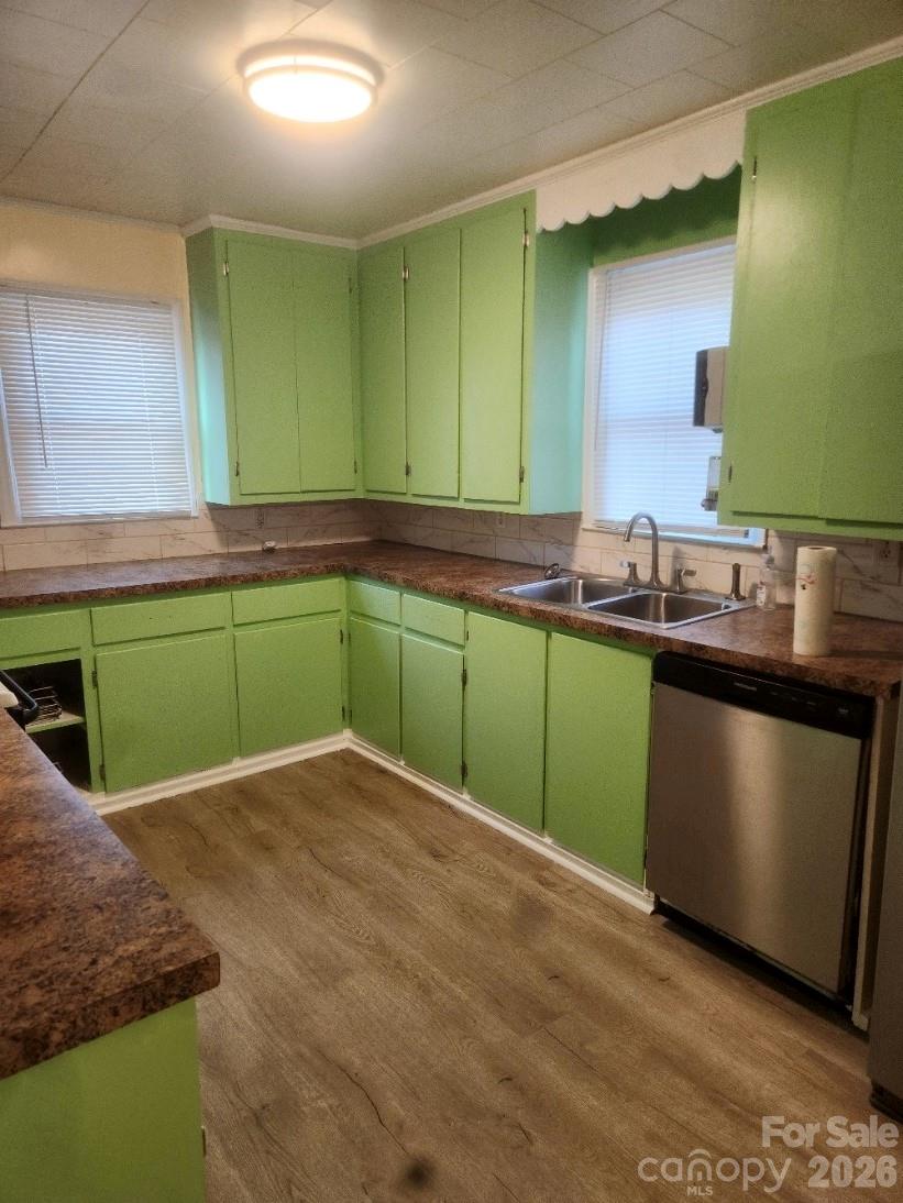 155 Robbins Street Southwest Concord, NC 28025 - Photo 15 of 19 a bathroom with a sink and a mirror