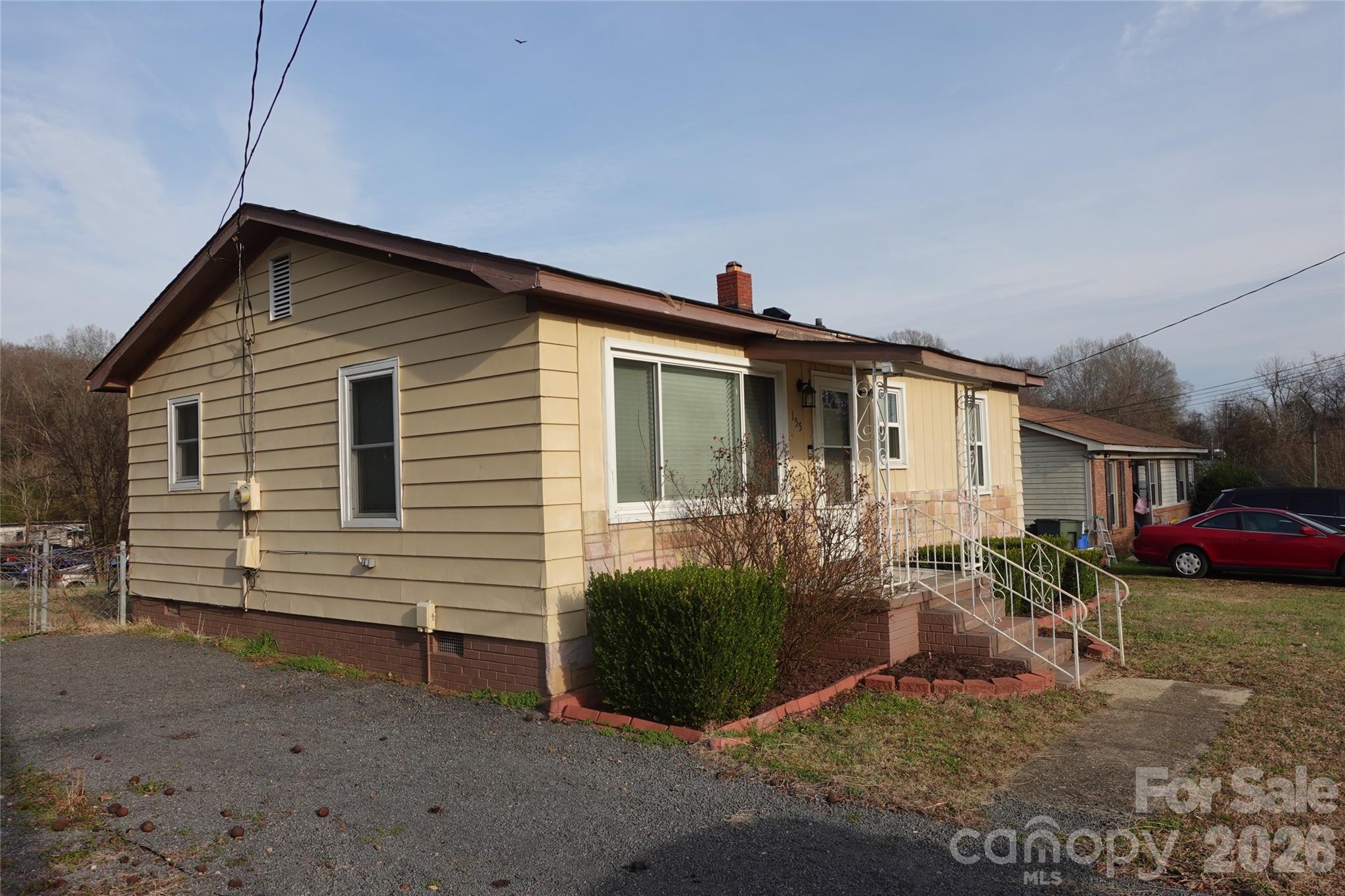155 Robbins Street Southwest Concord, NC 28025 - Photo 2 of 19 a view of a house with a yard