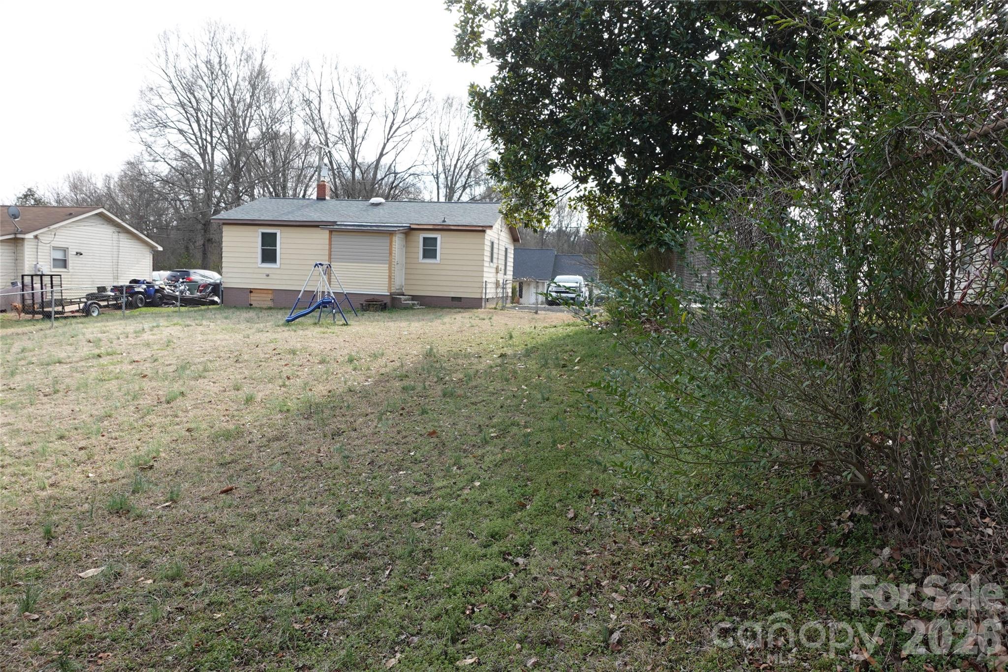 155 Robbins Street Southwest Concord, NC 28025 - Photo 3 of 19 a view of a house with a yard