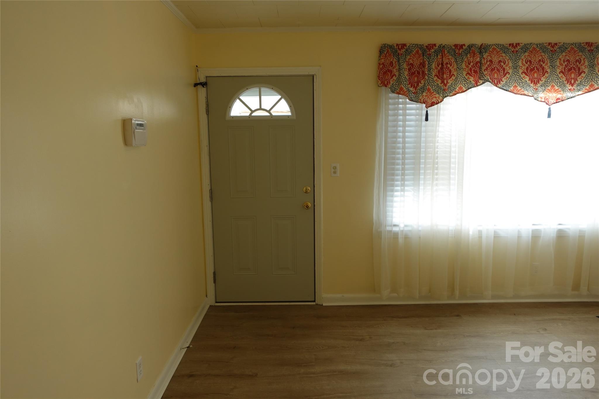 155 Robbins Street Southwest Concord, NC 28025 - Photo 5 of 19 a view of empty room with windows