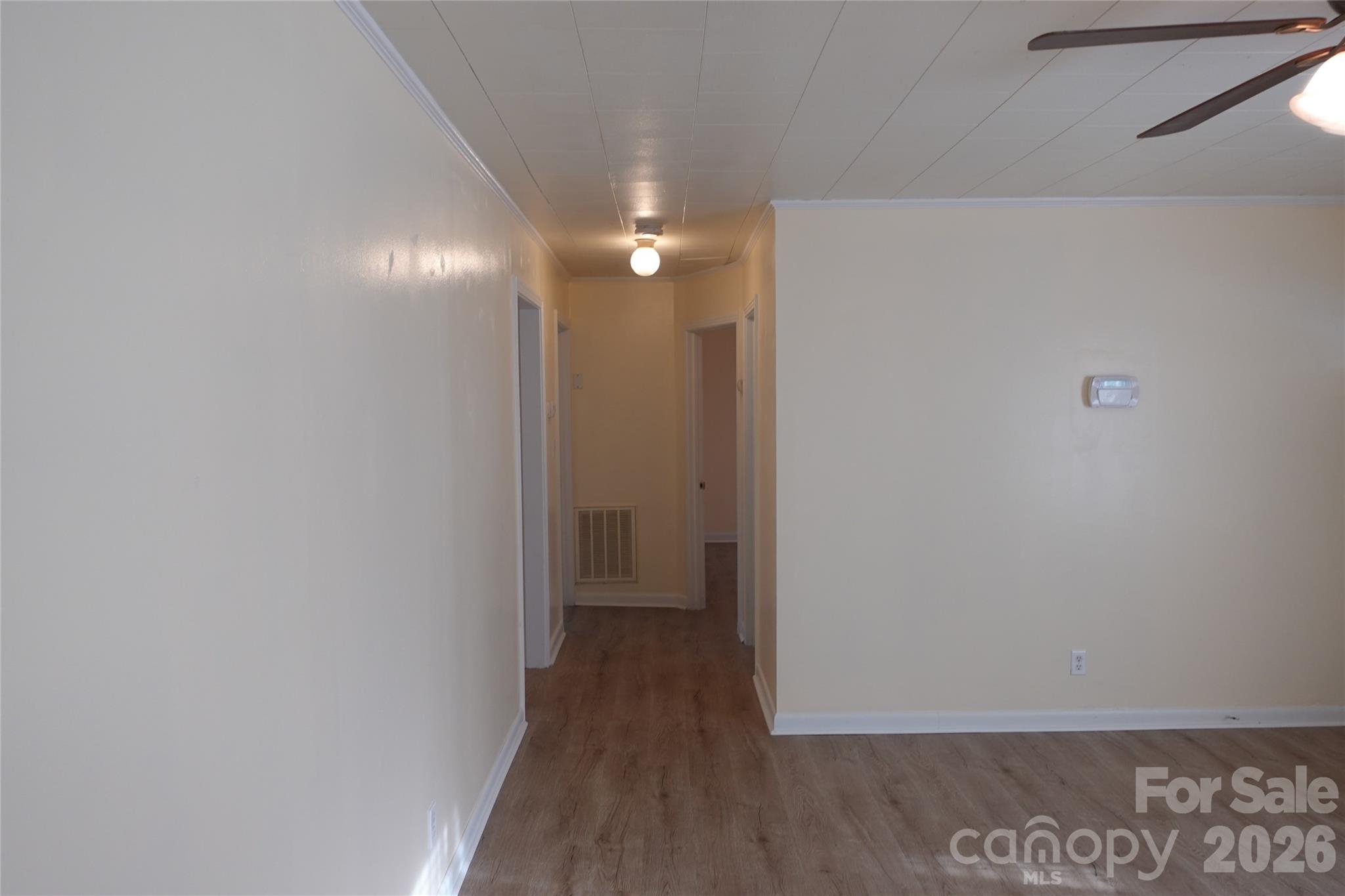 155 Robbins Street Southwest Concord, NC 28025 - Photo 6 of 19 a view of a hallway with wooden floor