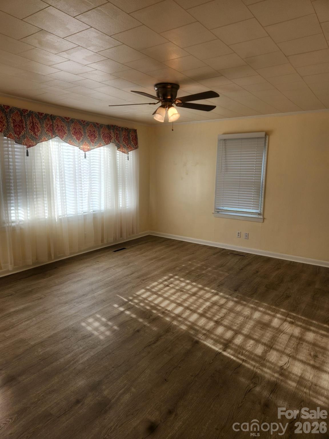 155 Robbins Street Southwest Concord, NC 28025 - Photo 7 of 19 an empty room with windows