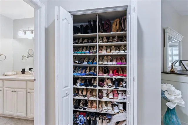 a view of a bedroom with a closet