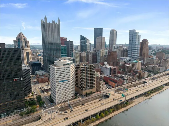 a view of a city with tall buildings