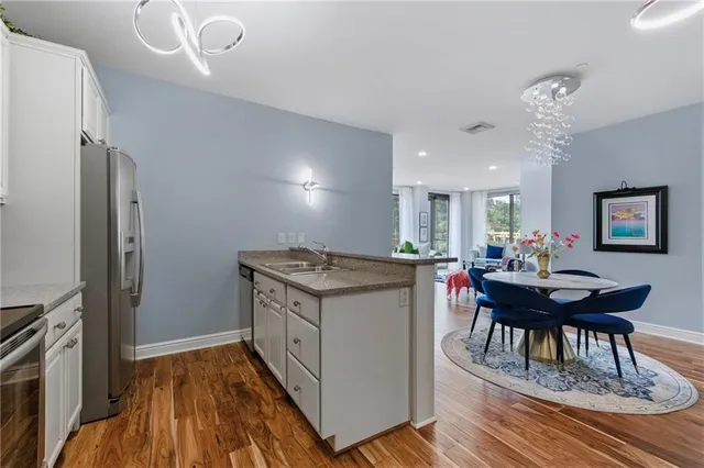 a kitchen with a table and chairs