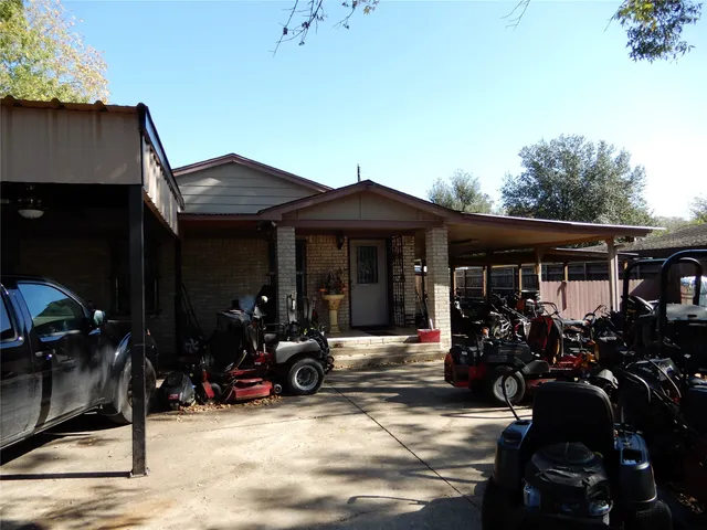 a view of house with patio outdoor seating space