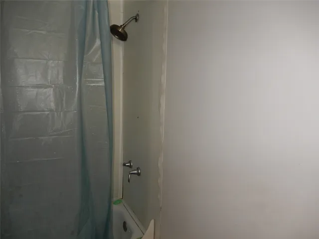 a bathroom with a toilet sink and vanity