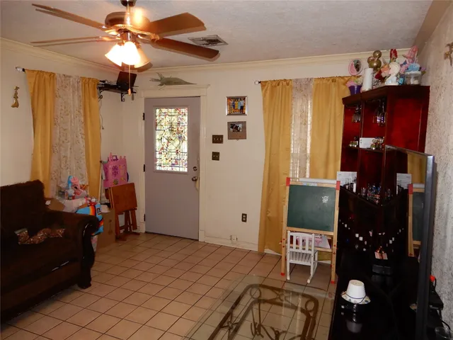 a kitchen with stainless steel appliances granite countertop a stove and cabinets
