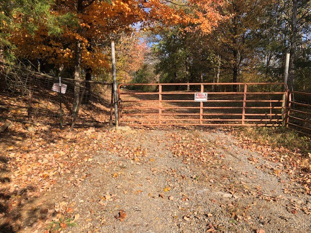 334 Cathcart Road Frankewing, TN 38459 - Photo 18 of 25 a backyard of a house with wooden floor and fence