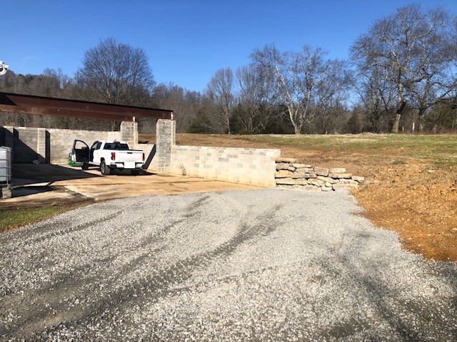 334 Cathcart Road Frankewing, TN 38459 - Photo 24 of 25 a view of a yard with a car parked in the yard