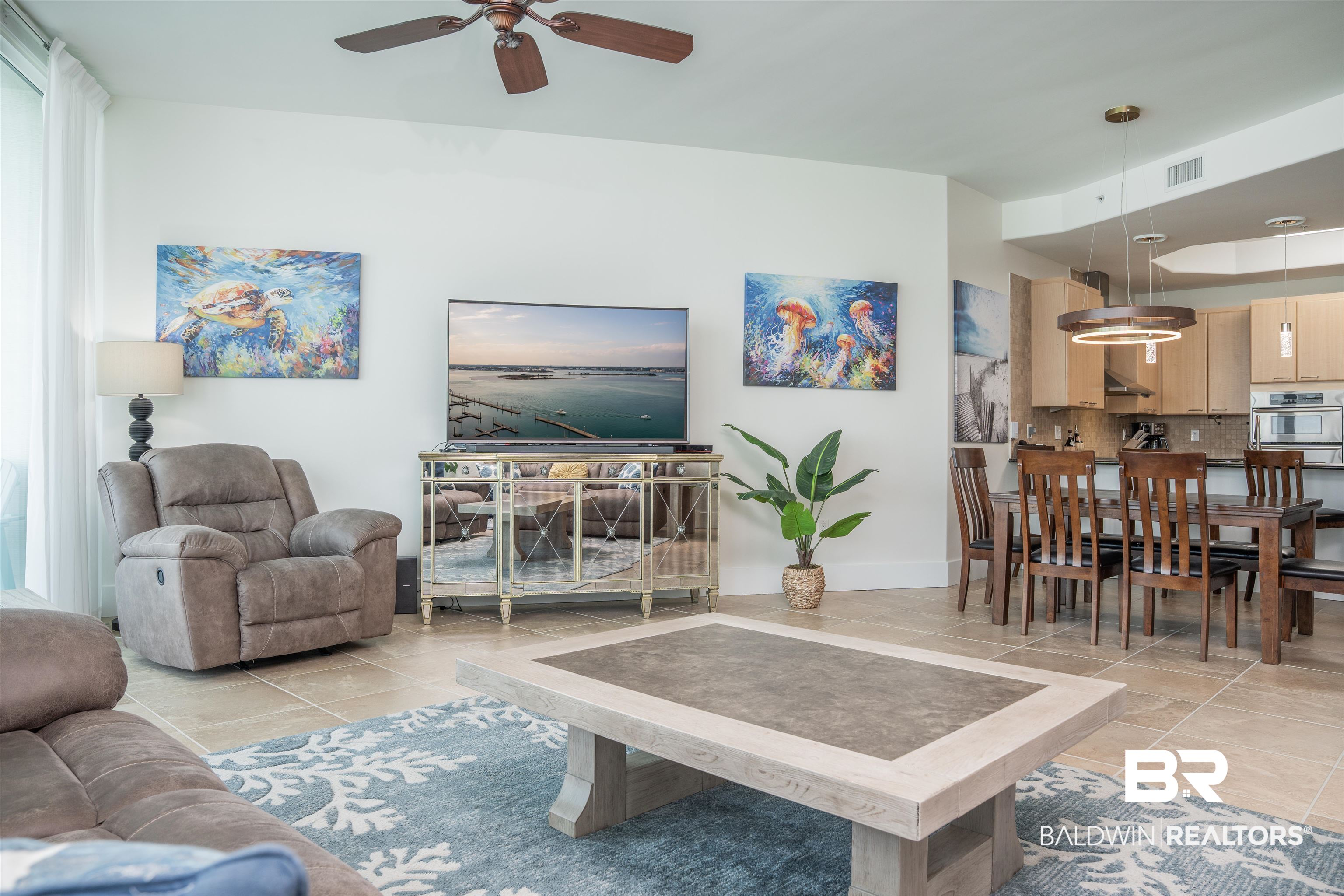 28107 Perdido Beach Boulevard, Unit DPH05 Orange Beach, AL 36561 - Photo 4 of 43 Living room featuring a ceiling fan